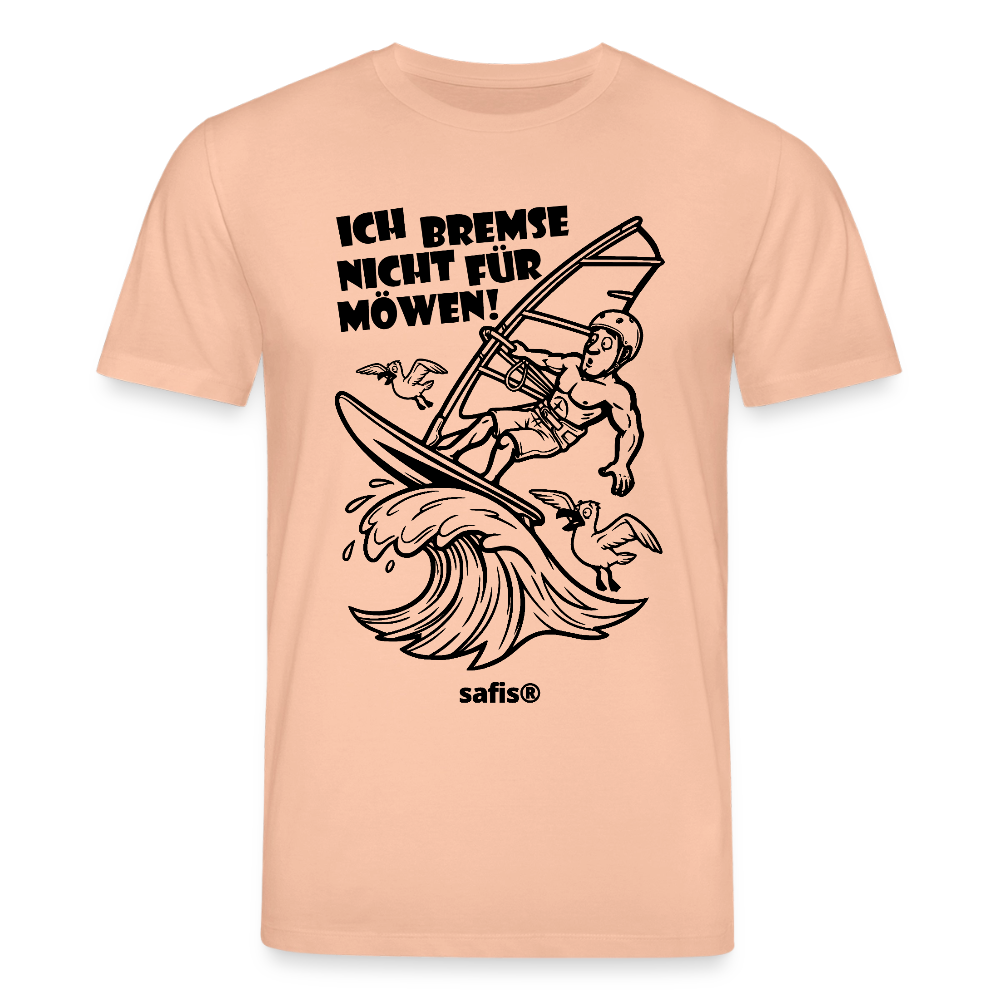 Schwarzer print vorn auf einem pfirsichfarbenen safis® T-Shirt aus Bio-Baumwolle mit der Aufschrift 'ICH BREMSE NICHT FÜR MÖWEN!'. Die Cartoon-Grafik zeigt einen Windsurfer mit Helm auf einer Welle, umringt von fliegenden Möwen. -Möwe- Unisex Bio-T-Shirt CREATOR - Pfirsich