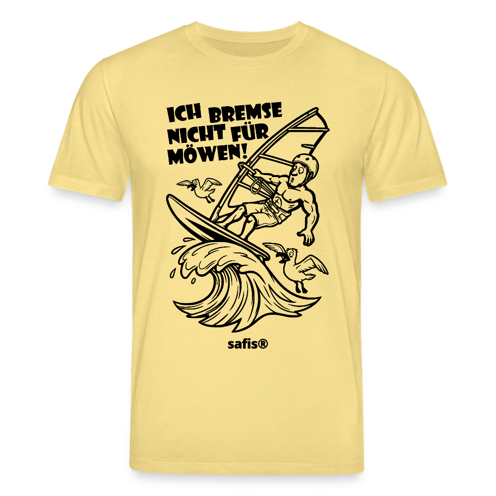 Schwarzer print vorn auf einem hellgelben safis® T-Shirt aus Bio-Baumwolle mit der Aufschrift 'ICH BREMSE NICHT FÜR MÖWEN!'. Die Cartoon-Grafik zeigt einen Windsurfer mit Helm auf einer Welle, umringt von fliegenden Möwen. -Möwe- Unisex Bio-T-Shirt CREATOR - Gelb Viva 